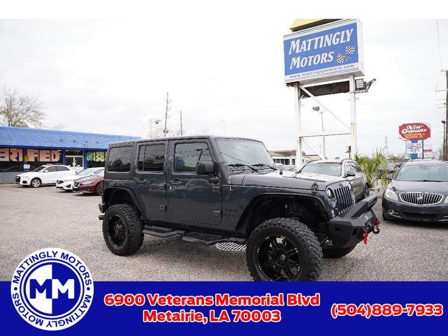 used 2016 Jeep Wrangler Unlimited car, priced at $19,697
