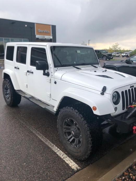 used 2015 Jeep Wrangler Unlimited car, priced at $20,444