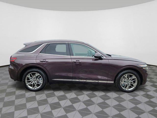 used 2023 Genesis GV70 car, priced at $42,919