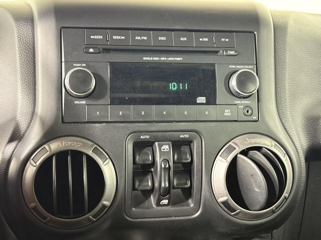 used 2015 Jeep Wrangler Unlimited car, priced at $18,999