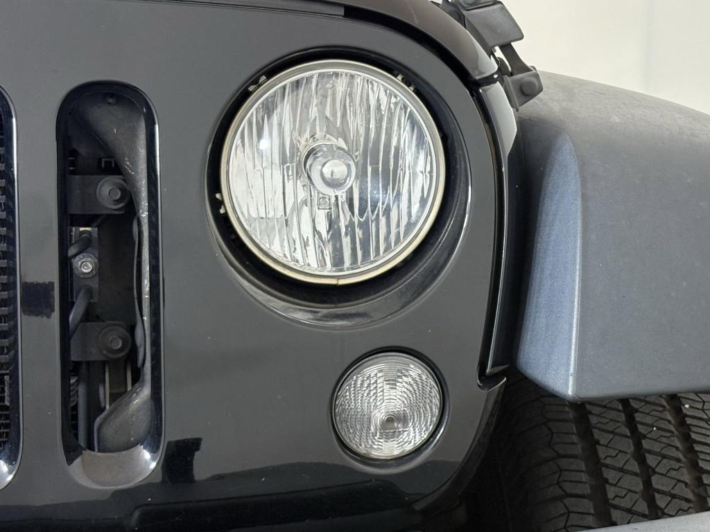 used 2015 Jeep Wrangler Unlimited car, priced at $18,999