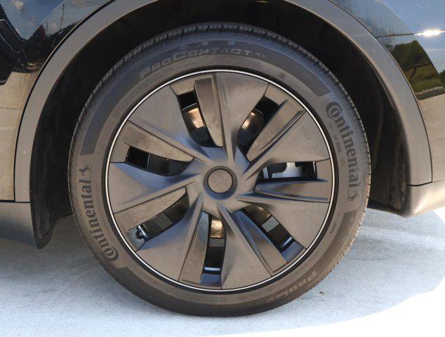 used 2025 Tesla Model Y car, priced at $40,288