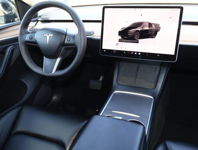 used 2025 Tesla Model Y car, priced at $40,288