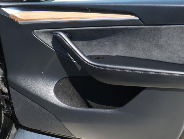 used 2025 Tesla Model Y car, priced at $40,288