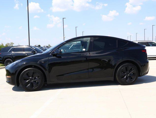 used 2025 Tesla Model Y car, priced at $40,288