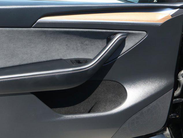 used 2025 Tesla Model Y car, priced at $40,288