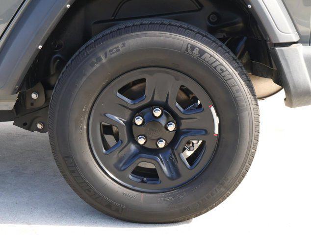 used 2023 Jeep Wrangler car, priced at $27,988