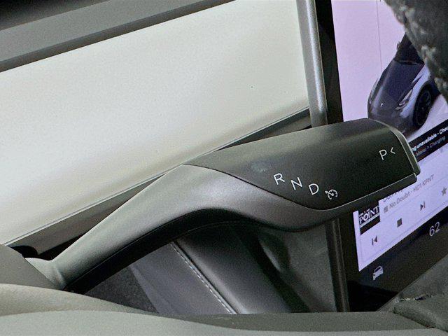 used 2023 Tesla Model Y car, priced at $30,897