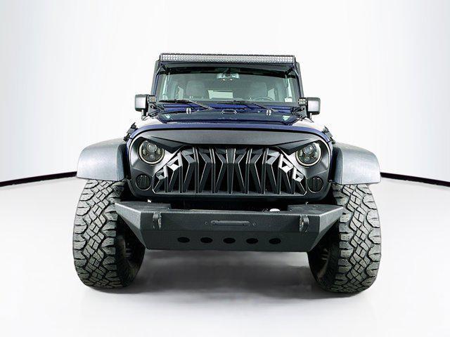 used 2013 Jeep Wrangler Unlimited car, priced at $14,599