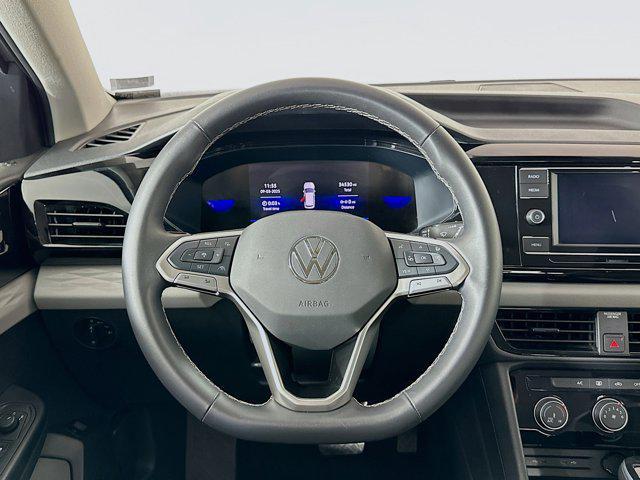 used 2024 Volkswagen Taos car, priced at $16,987