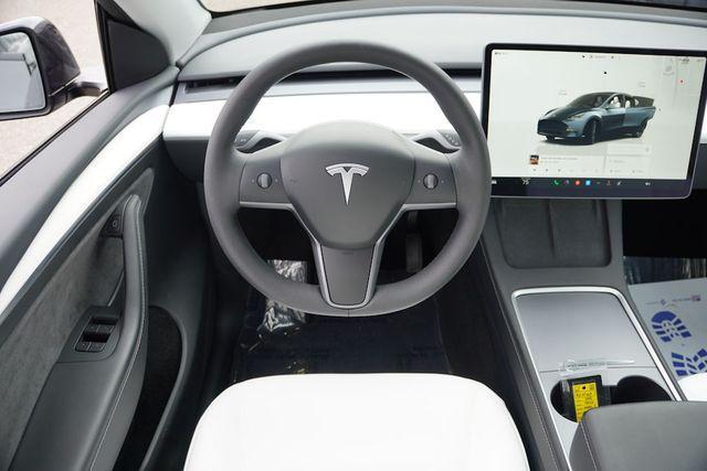 used 2025 Tesla Model Y car, priced at $41,487