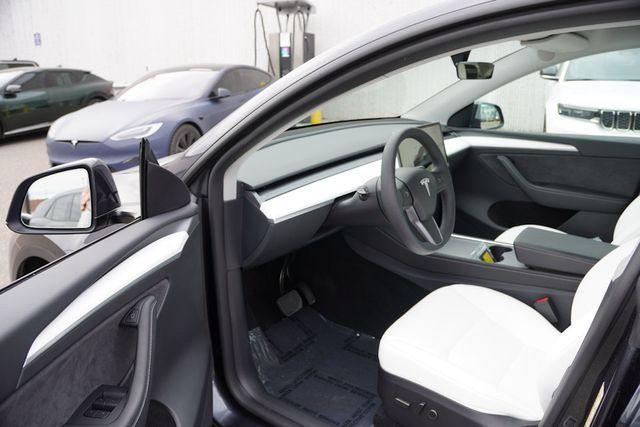 used 2025 Tesla Model Y car, priced at $41,487