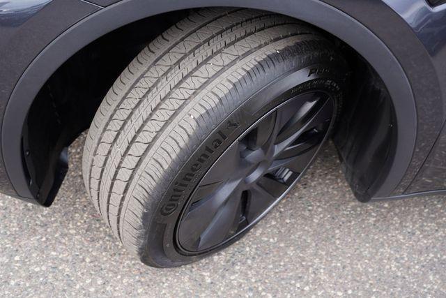 used 2025 Tesla Model Y car, priced at $41,487