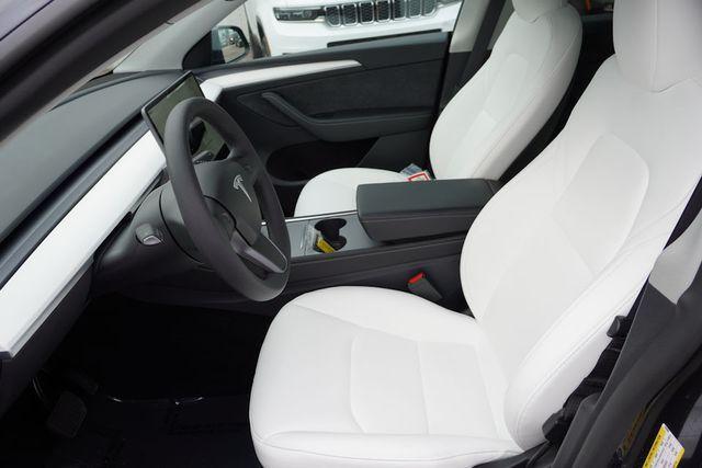 used 2025 Tesla Model Y car, priced at $41,487