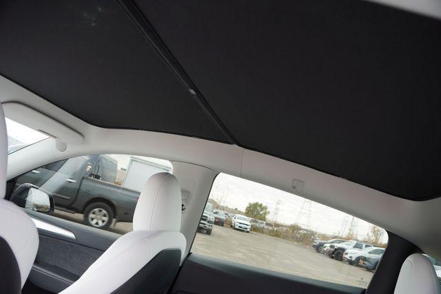 used 2023 Tesla Model Y car, priced at $34,282