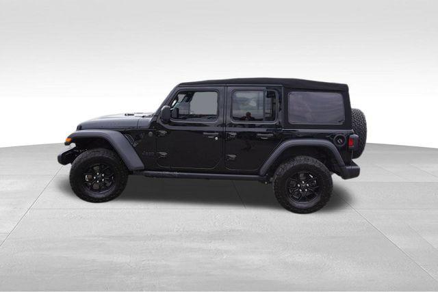 used 2024 Jeep Wrangler car, priced at $38,555