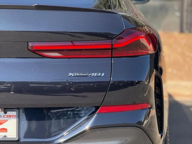 used 2021 BMW X6 car, priced at $53,985