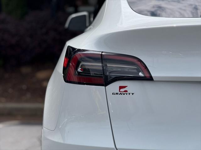 used 2021 Tesla Model Y car, priced at $27,895