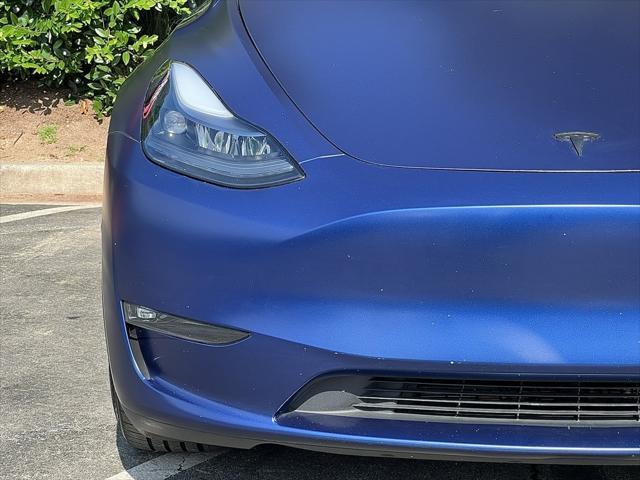 used 2023 Tesla Model Y car, priced at $32,859