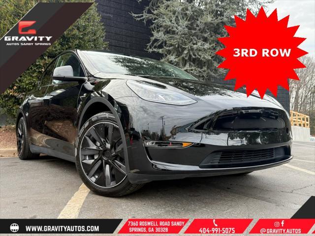 used 2023 Tesla Model Y car, priced at $33,659