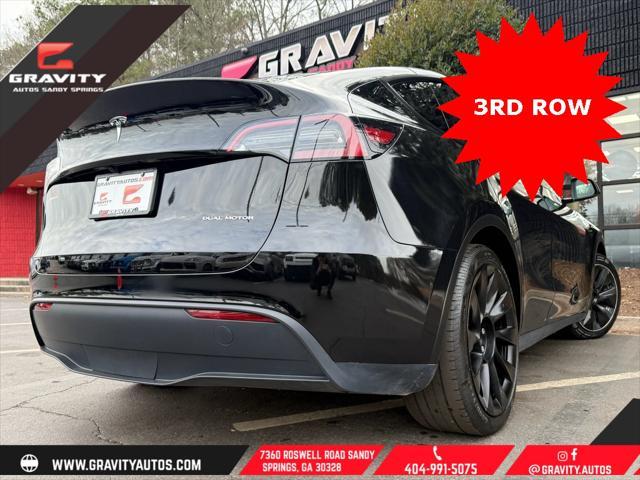 used 2023 Tesla Model Y car, priced at $33,659