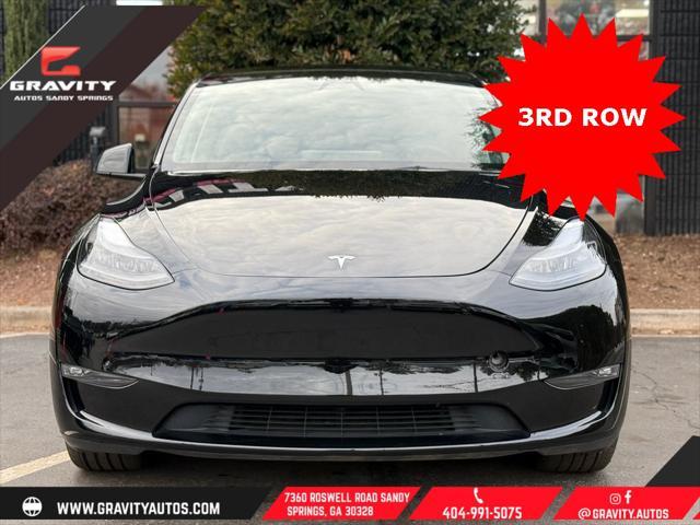 used 2023 Tesla Model Y car, priced at $33,659