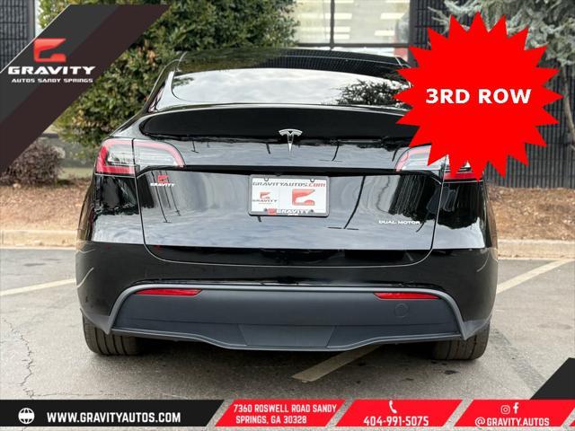 used 2023 Tesla Model Y car, priced at $33,659