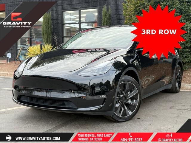 used 2023 Tesla Model Y car, priced at $33,659