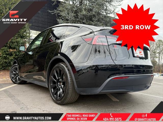 used 2023 Tesla Model Y car, priced at $33,659