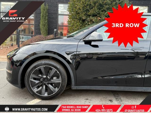 used 2023 Tesla Model Y car, priced at $33,659