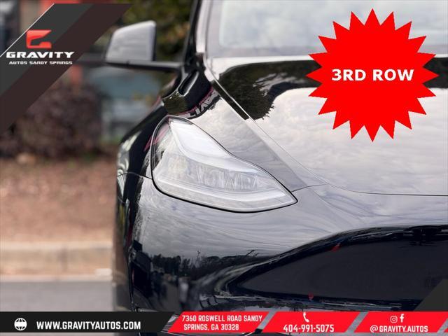 used 2023 Tesla Model Y car, priced at $33,659