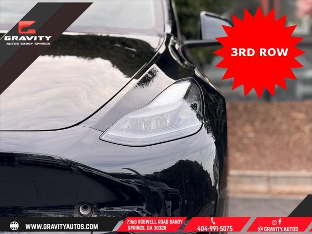 used 2023 Tesla Model Y car, priced at $33,659