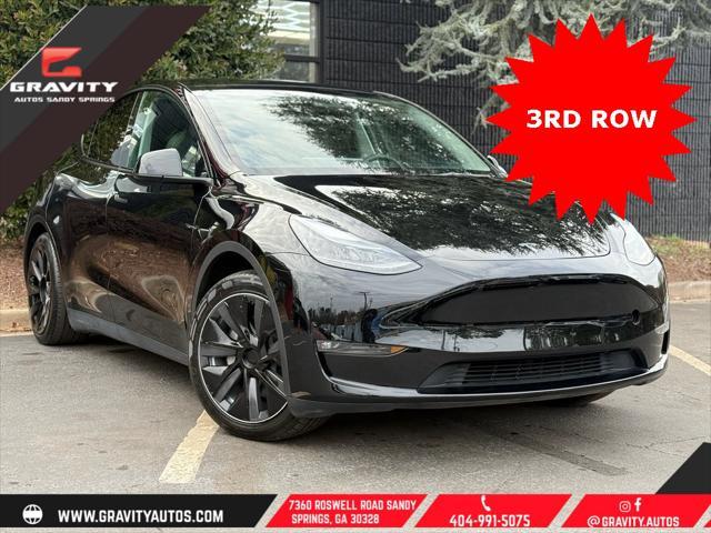 used 2023 Tesla Model Y car, priced at $33,659