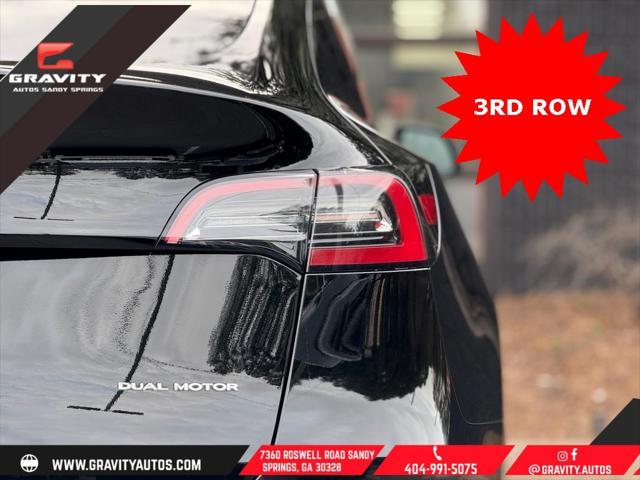 used 2023 Tesla Model Y car, priced at $33,659