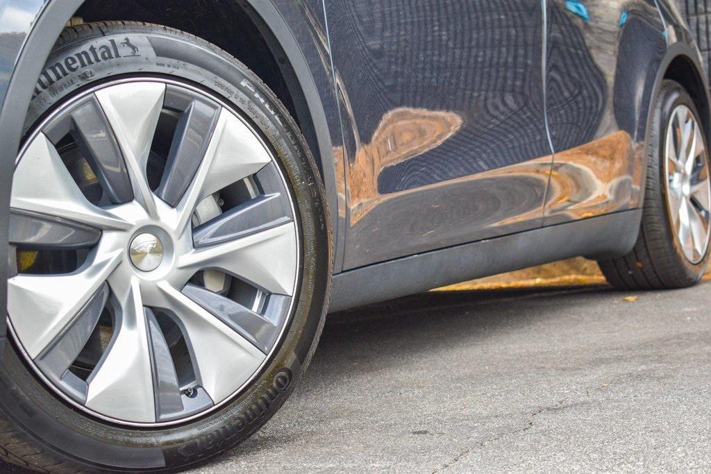 used 2023 Tesla Model Y car, priced at $27,895