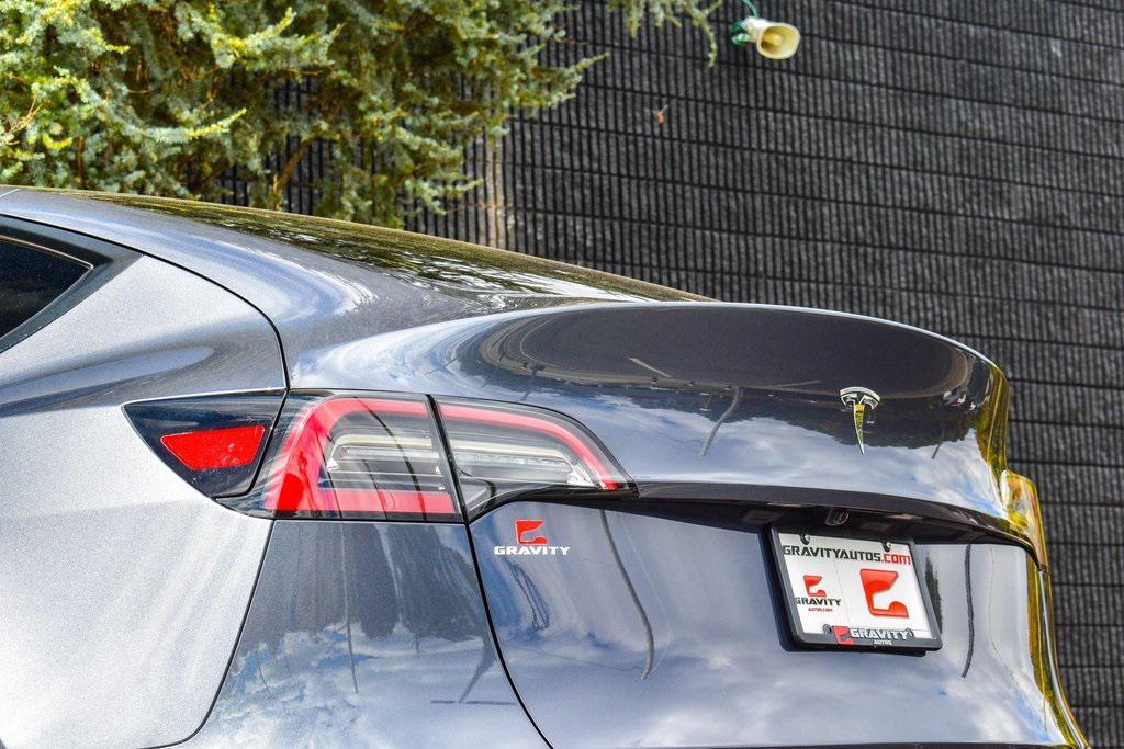 used 2023 Tesla Model Y car, priced at $27,895