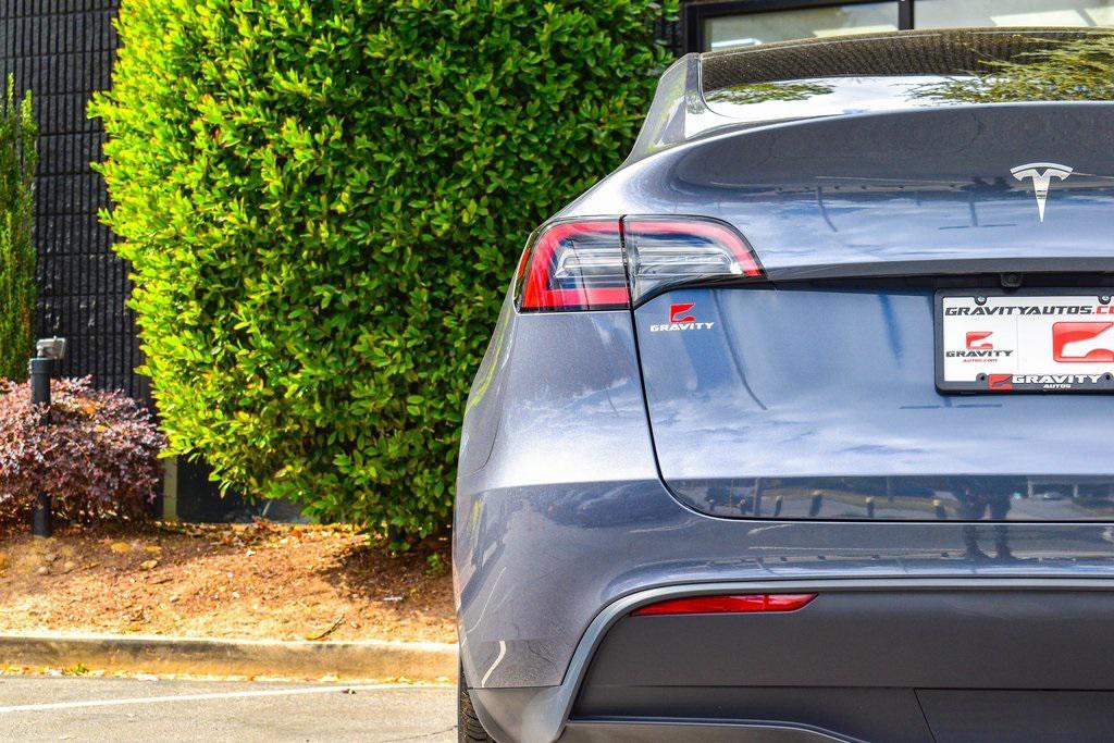 used 2023 Tesla Model Y car, priced at $27,895