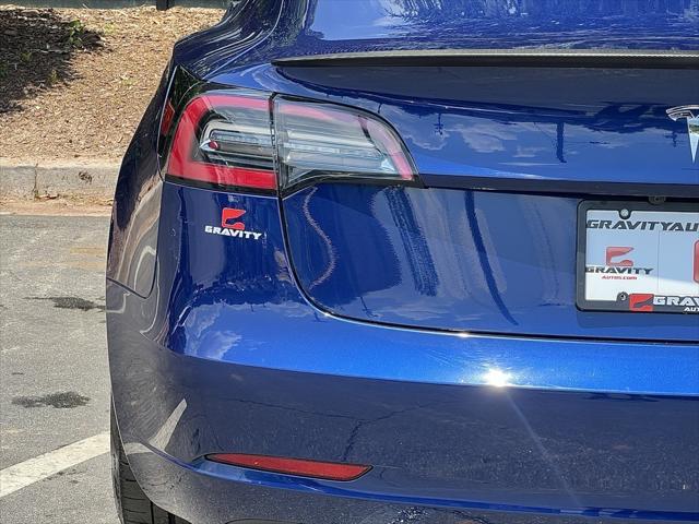 used 2023 Tesla Model 3 car, priced at $27,895