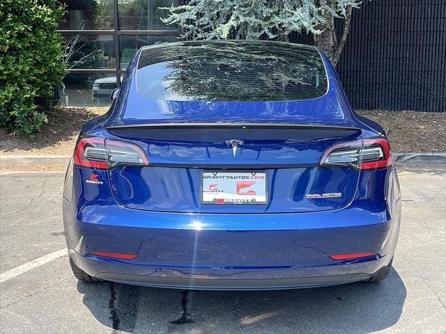 used 2023 Tesla Model 3 car, priced at $27,895
