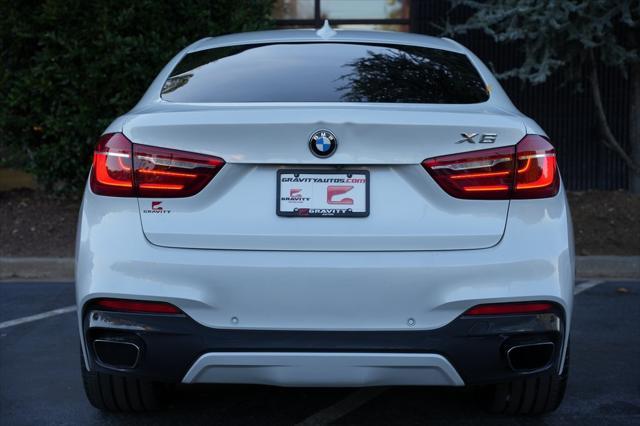 used 2019 BMW X6 car, priced at $34,985