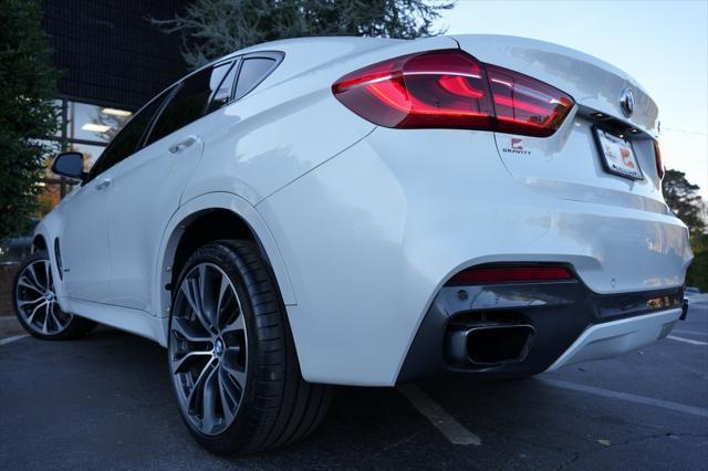 used 2019 BMW X6 car, priced at $34,985