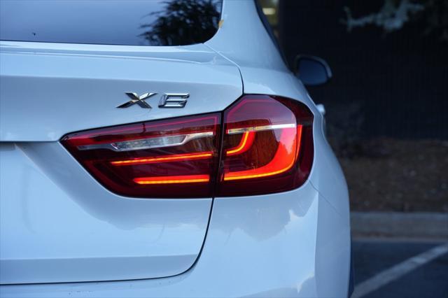 used 2019 BMW X6 car, priced at $34,985