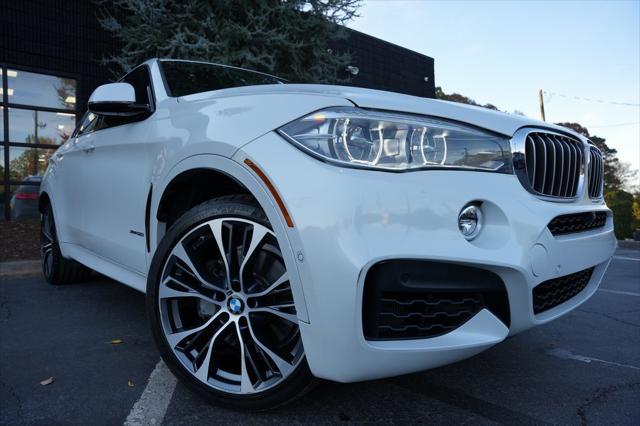 used 2019 BMW X6 car, priced at $34,985