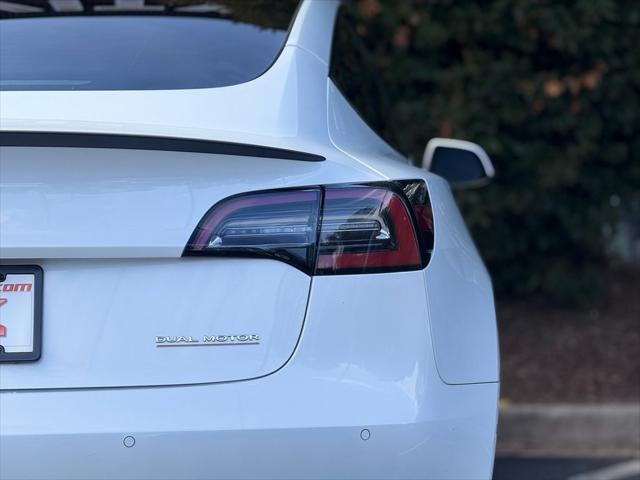 used 2022 Tesla Model 3 car, priced at $30,795