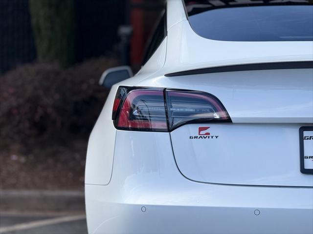 used 2022 Tesla Model 3 car, priced at $30,795