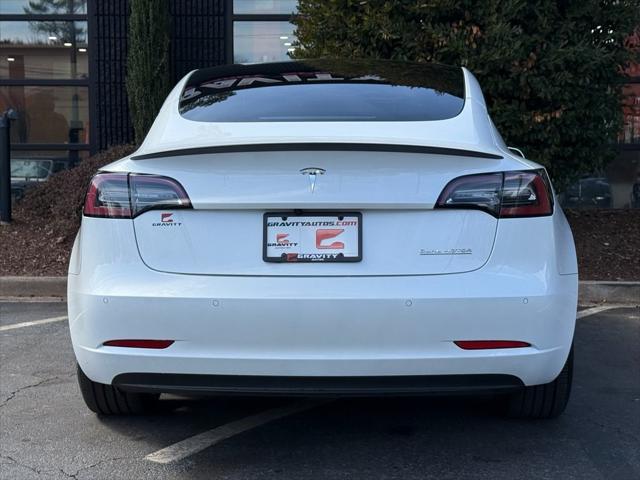 used 2022 Tesla Model 3 car, priced at $30,795