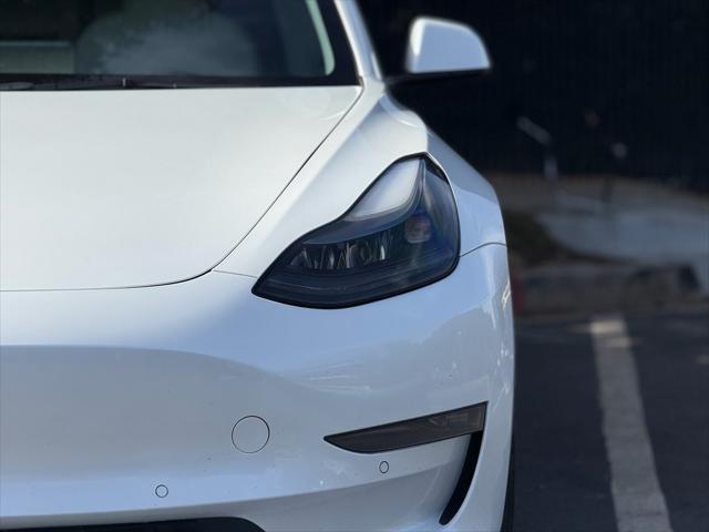 used 2022 Tesla Model 3 car, priced at $30,795