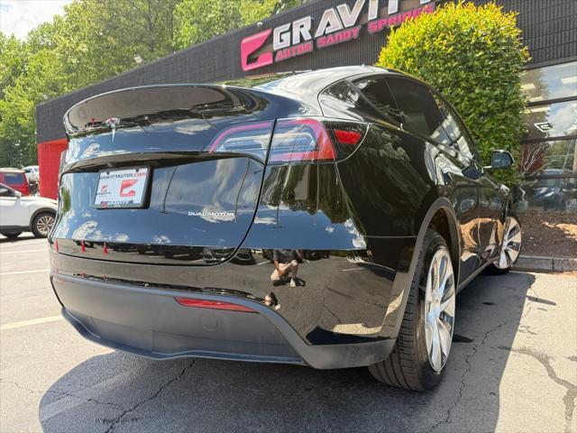 used 2023 Tesla Model Y car, priced at $30,985