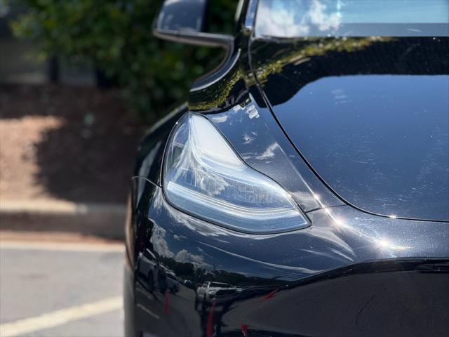 used 2023 Tesla Model Y car, priced at $30,985