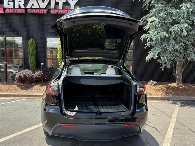 used 2023 Tesla Model Y car, priced at $30,985